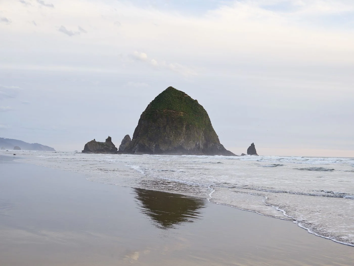 Haystack Rock reflected on Cannon Beach Oregon