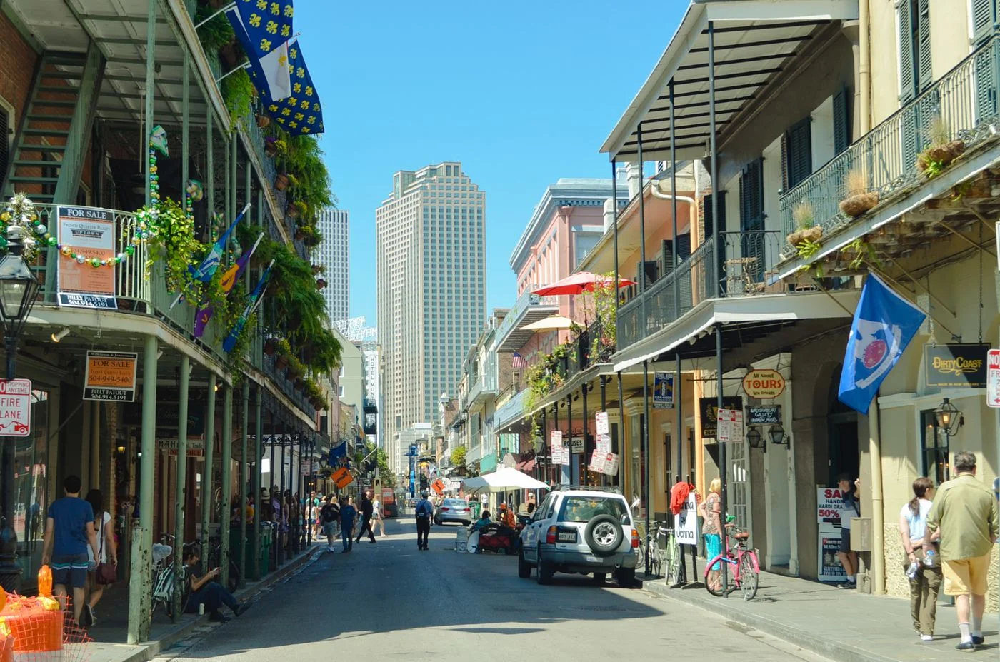 Buildings and pedestrians in the French Quarter of New Orleans
